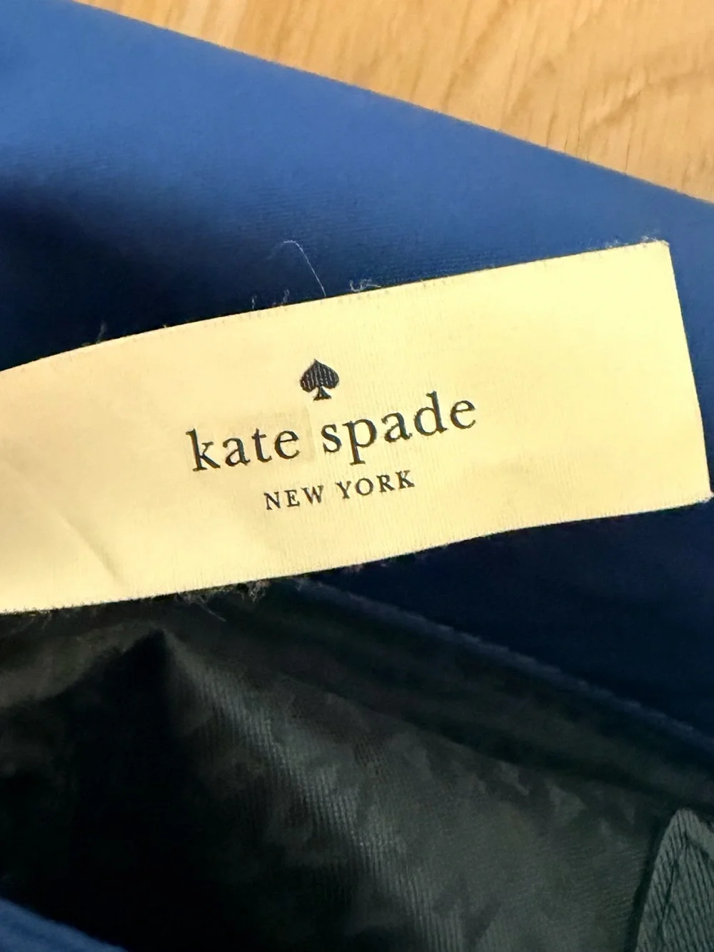 kate spade cobalt blue nylon crossbody with black strap